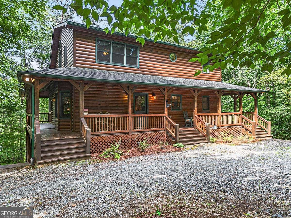 3 bedroom, 3 bathroom, 2,352 sq ft single family residence for sale at 115 Lakota Trail, Blue Ridge, GA 30513 — photo 1 of 49