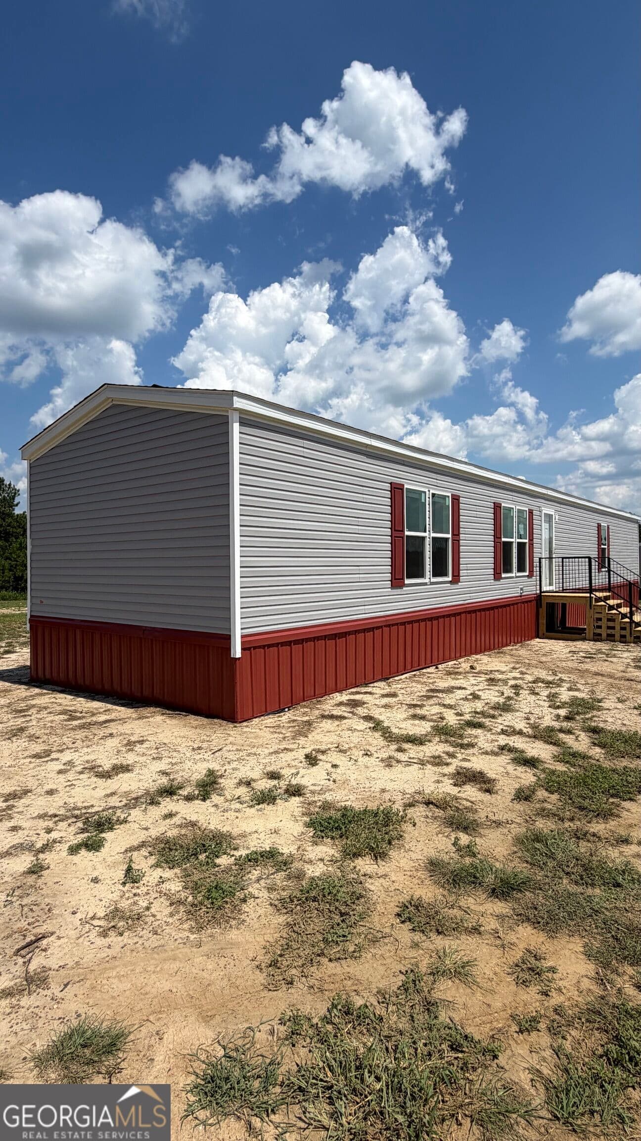 3 bedroom, 2 bathroom, 1,280 sq ft manufactured home,single family residence under contract at 950 Collins Lane, Rentz, GA 31075 — photo 2