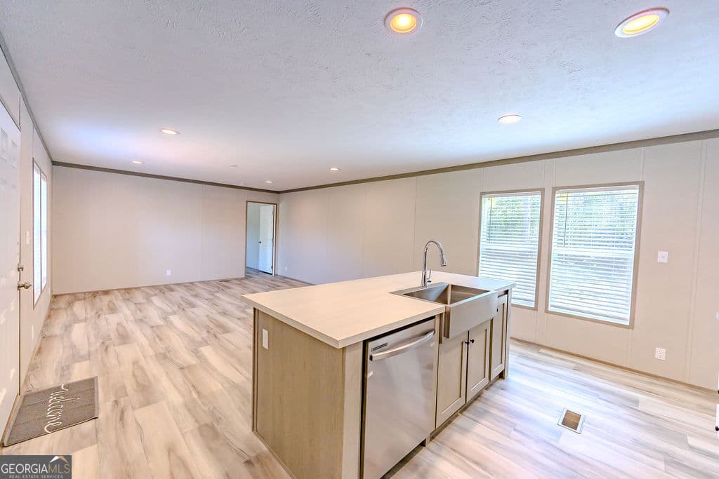 3 bedroom, 2 bathroom, 1,280 sq ft manufactured home,single family residence under contract at 950 Collins Lane, Rentz, GA 31075 — photo 6
