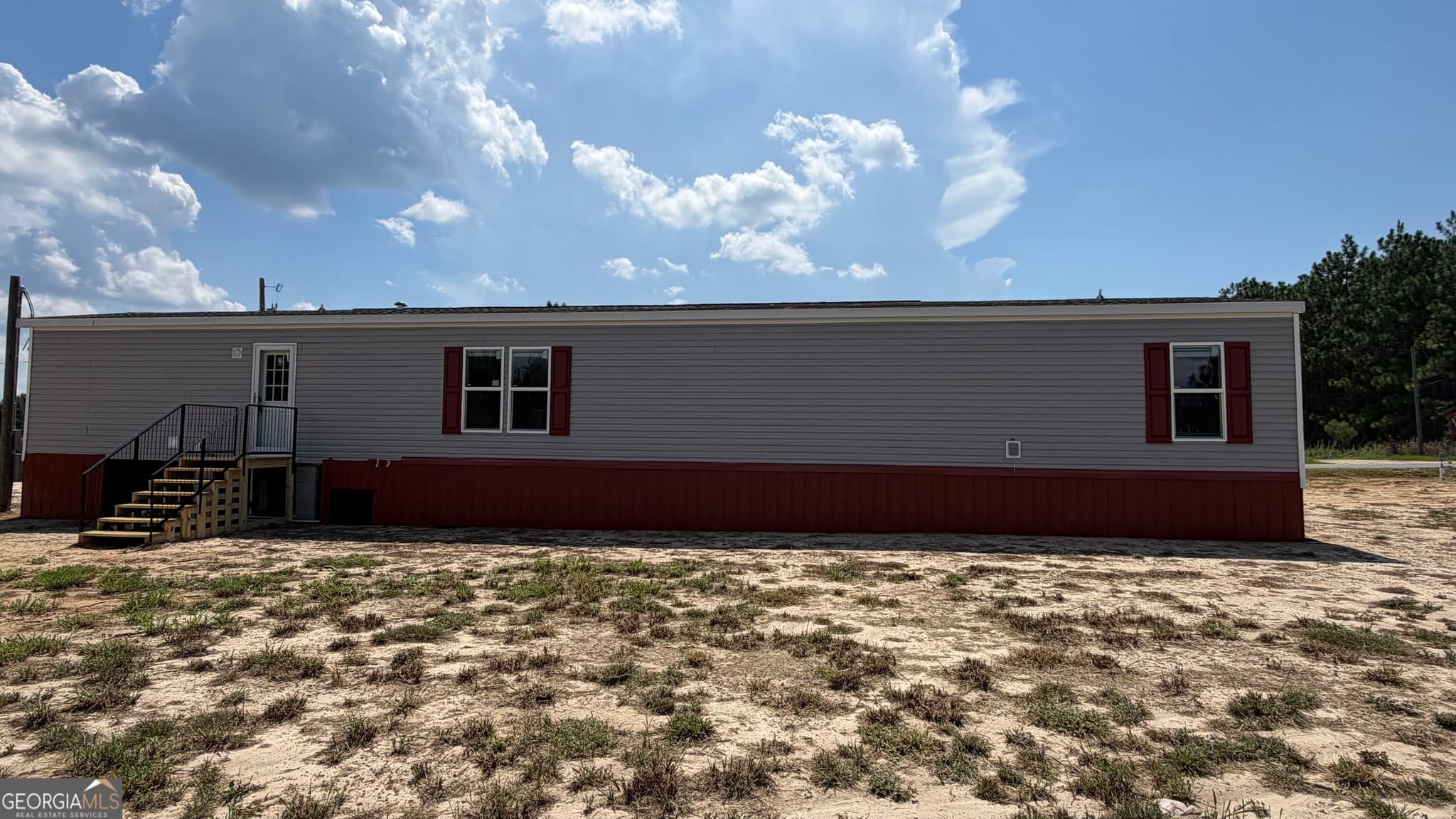 3 bedroom, 2 bathroom, 1,280 sq ft manufactured home,single family residence under contract at 950 Collins Lane, Rentz, GA 31075 — photo 3