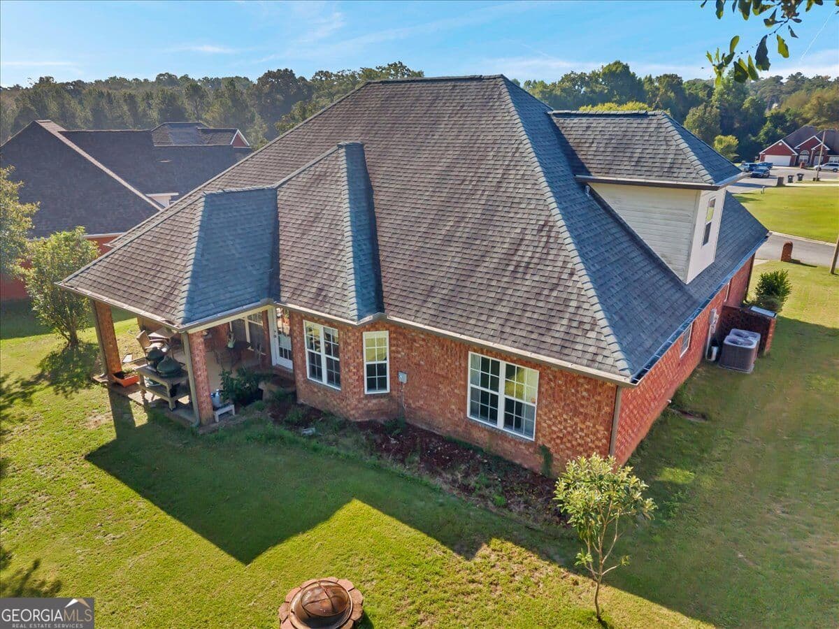 4 bedroom, 3 bathroom, 2,128 sq ft single family residence for sale at 609 Links View Drive, Bonaire, GA 31005 — photo 7