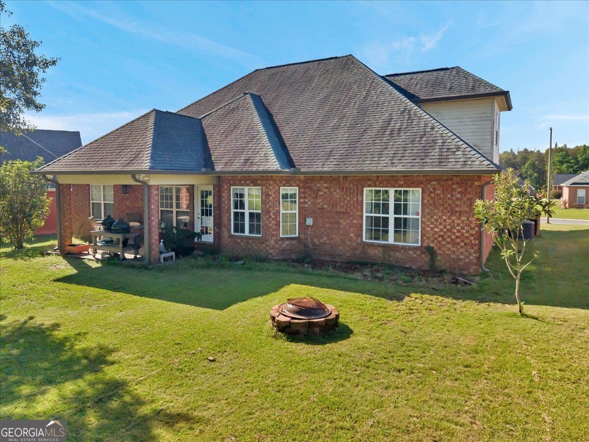 4 bedroom, 3 bathroom, 2,128 sq ft single family residence for sale at 609 Links View Drive, Bonaire, GA 31005 — photo 9