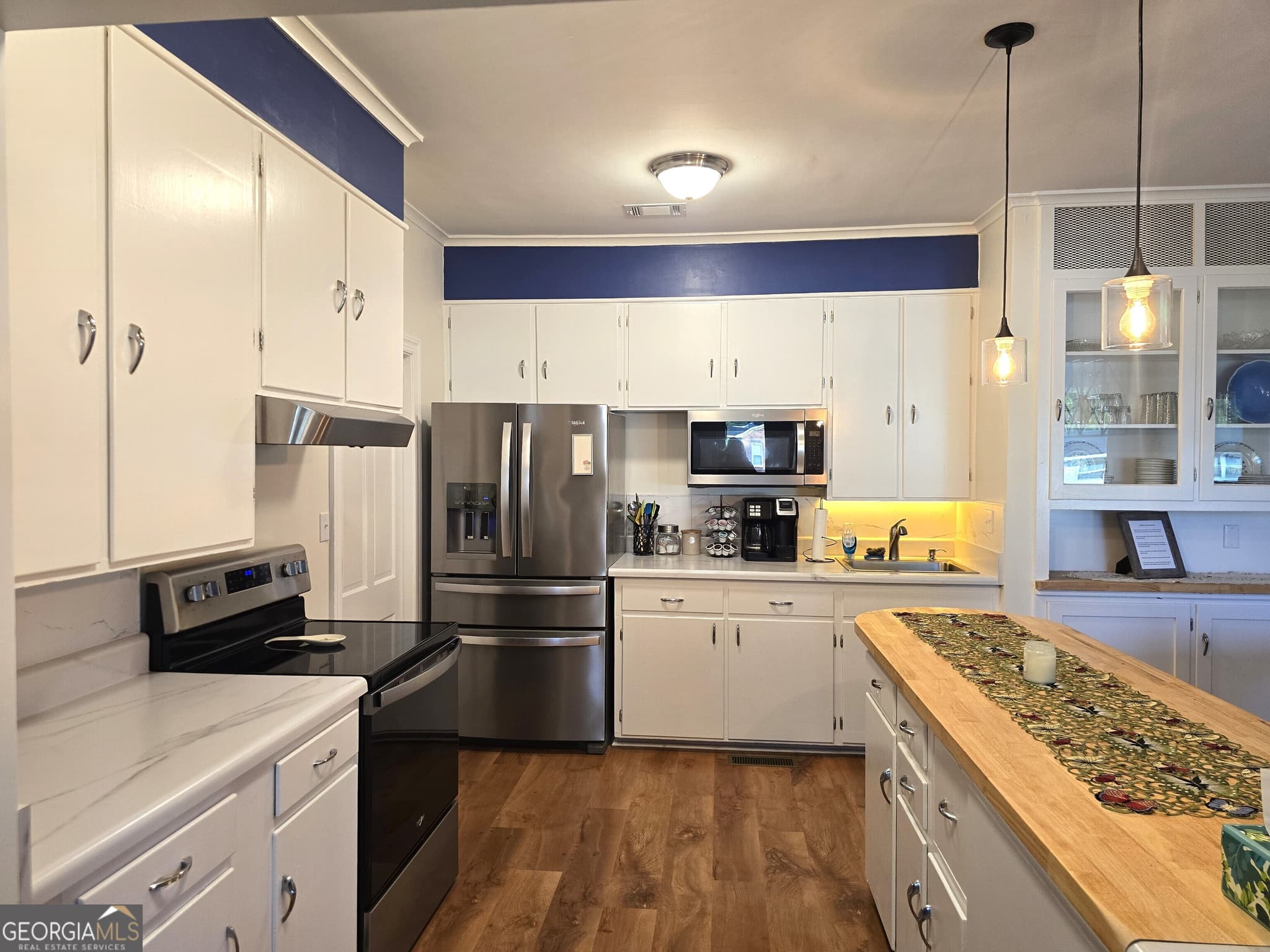 3 bedroom, 3.5 bathroom, 3,139 sq ft single family residence for sale at 834 Academy Drive, Louisville, GA 30434 — photo 7