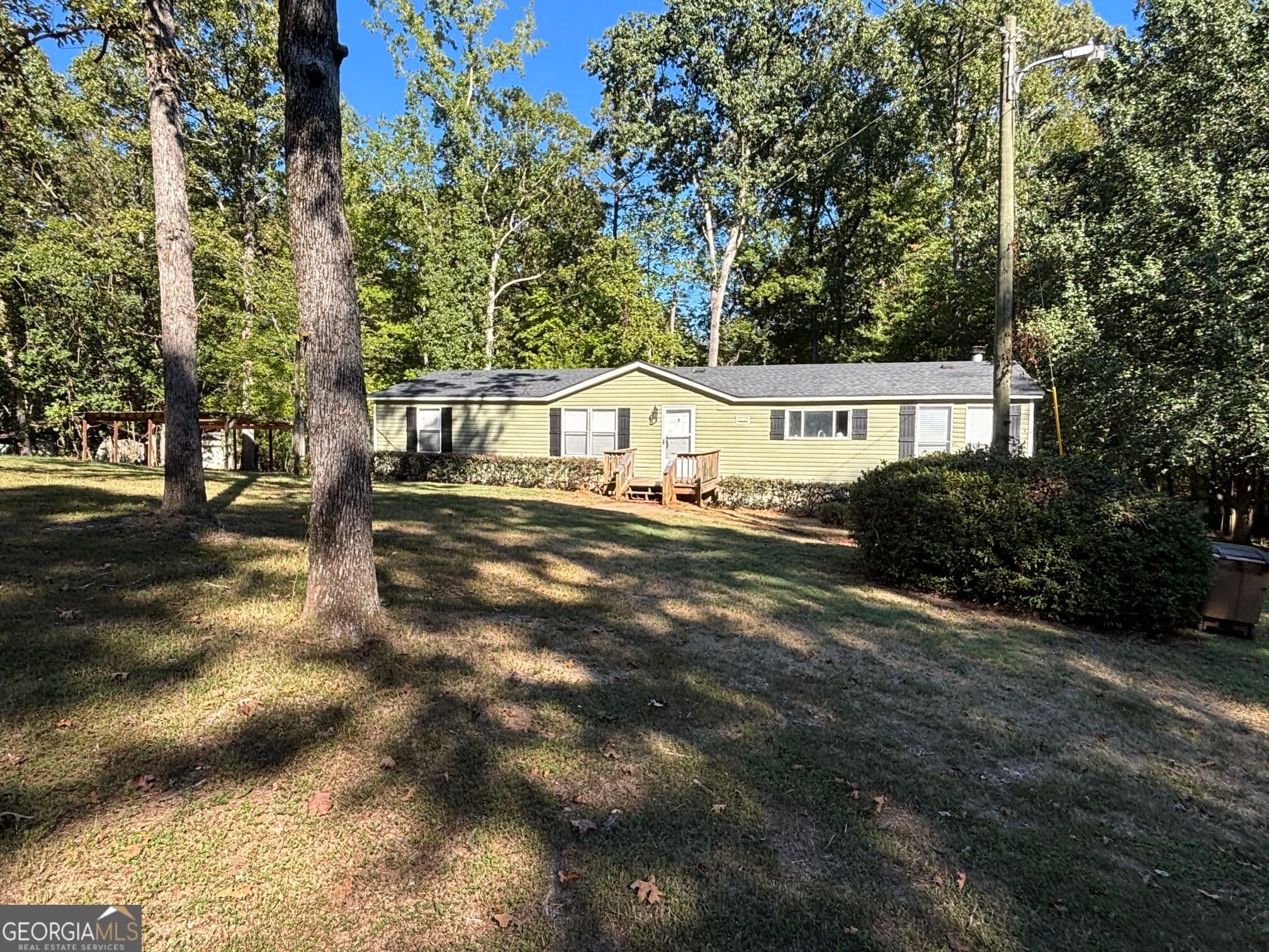 3 bedroom, 2 bathroom, 1,620 sq ft manufactured home,single family residence under contract at 5038 Buffington Road, Thomson, GA 30824 — photo 2