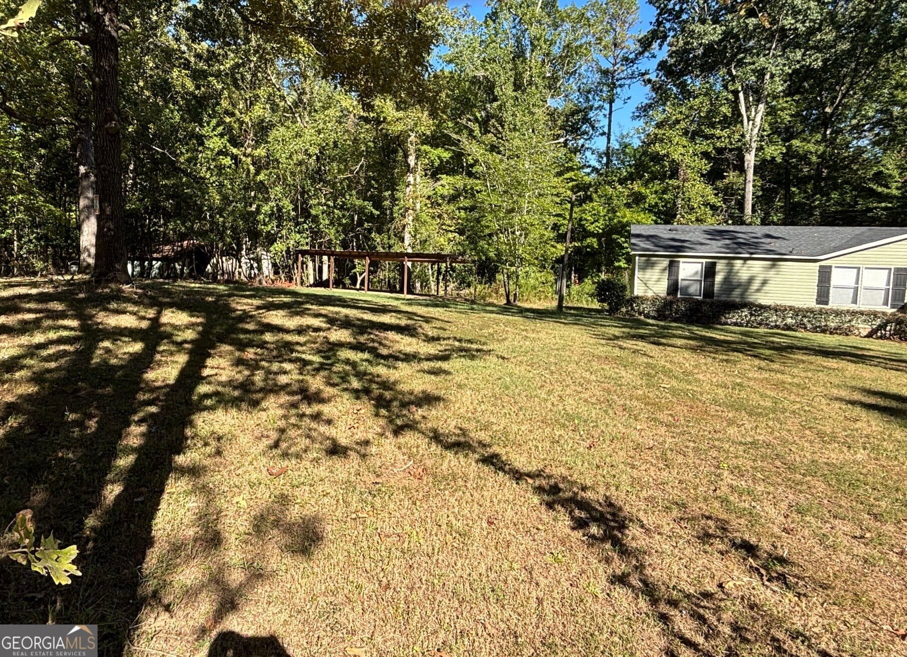 3 bedroom, 2 bathroom, 1,620 sq ft manufactured home,single family residence under contract at 5038 Buffington Road, Thomson, GA 30824 — photo 3
