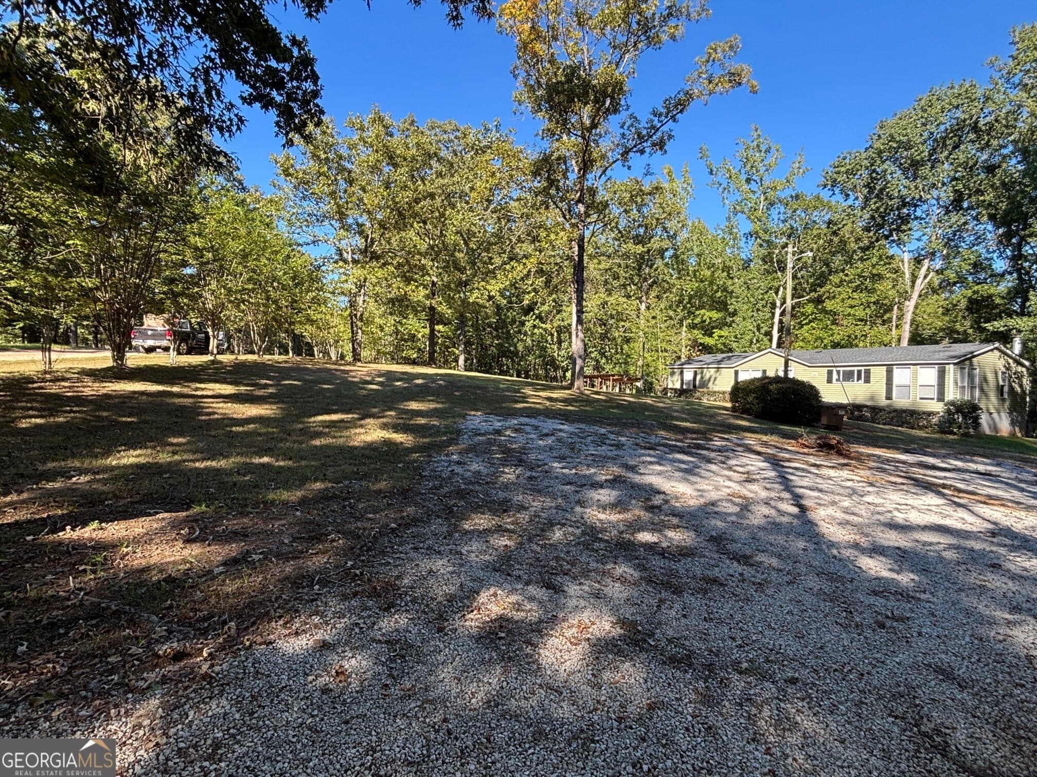3 bedroom, 2 bathroom, 1,620 sq ft manufactured home,single family residence under contract at 5038 Buffington Road, Thomson, GA 30824 — photo 4