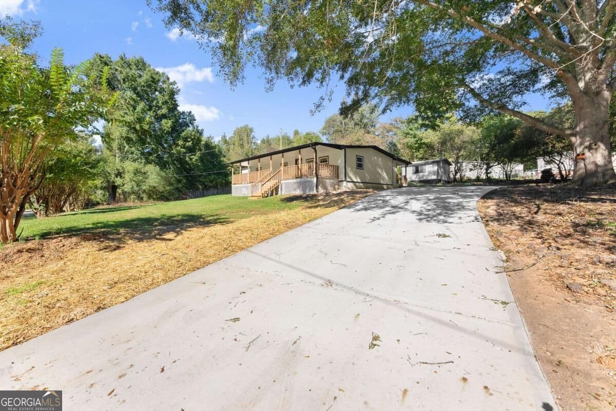 3 bedroom, 1.5 bathroom manufactured home,single family residence for sale at 2411 Bald Eagle Place, Gainesville, GA 30507 — photo 7