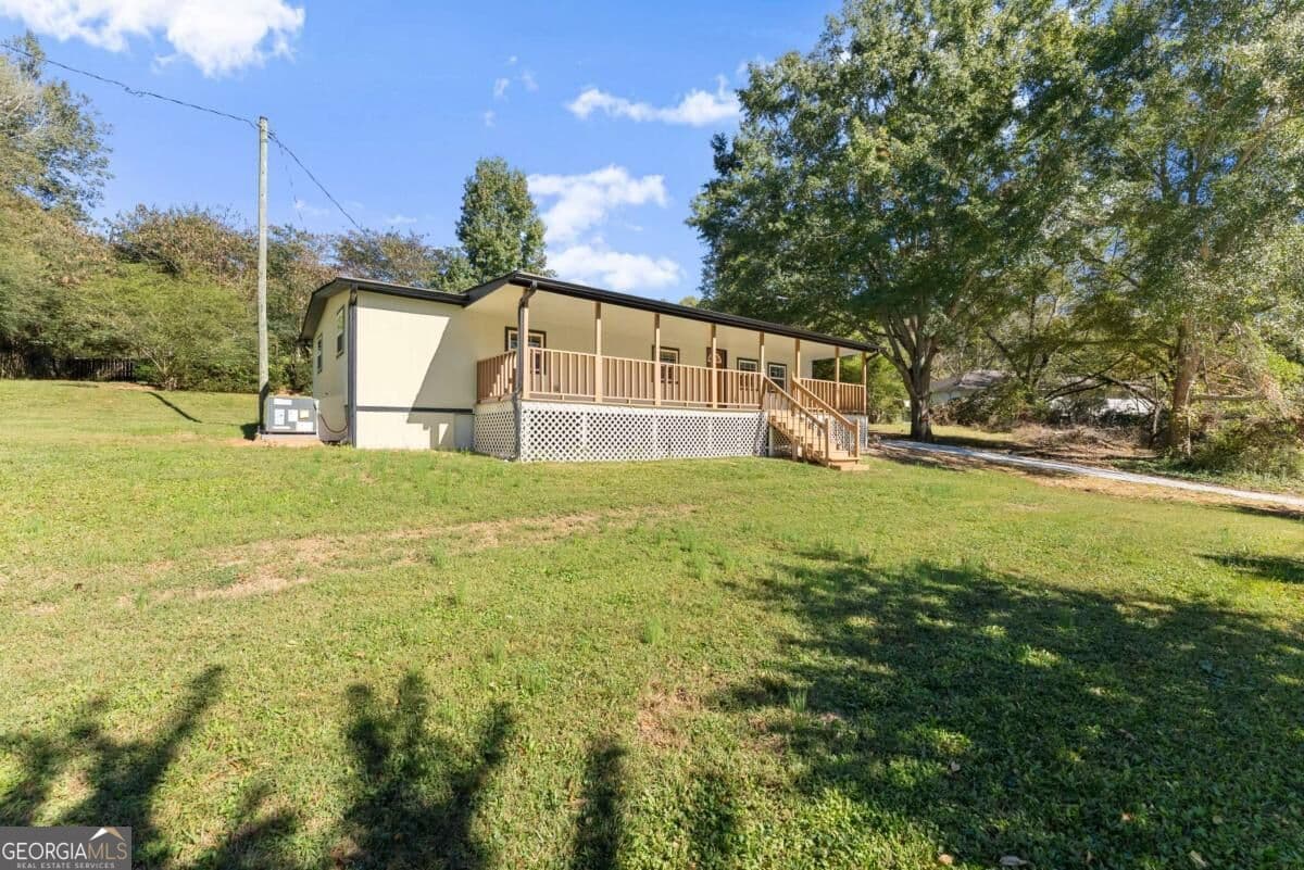 3 bedroom, 1.5 bathroom manufactured home,single family residence for sale at 2411 Bald Eagle Place, Gainesville, GA 30507 — photo 4