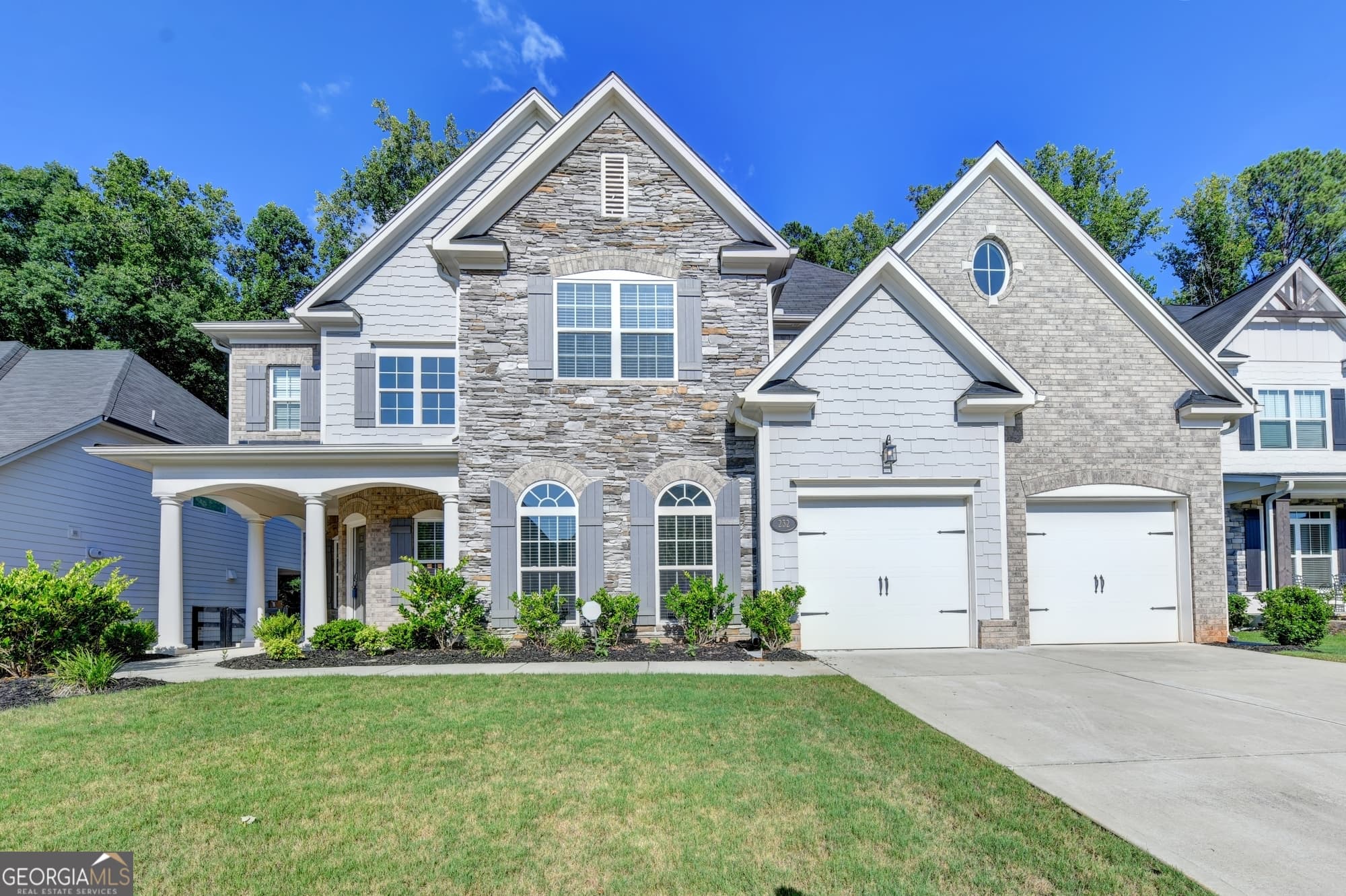 5 bedroom, 4 bathroom, 3,362 sq ft single family residence for sale at 232 Wild Rose Circle, Holly Springs, GA 30115 — photo 2