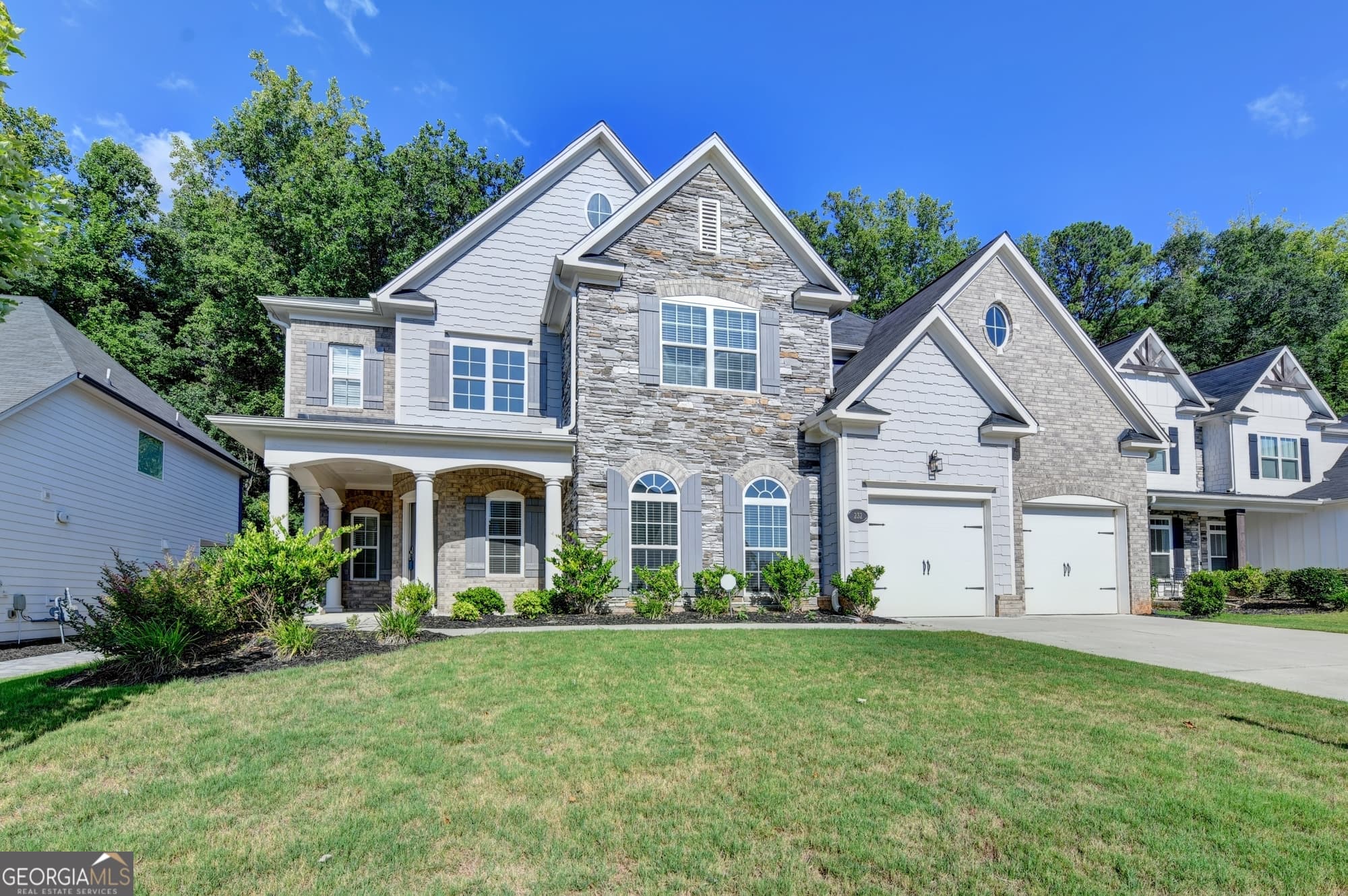 5 bedroom, 4 bathroom, 3,362 sq ft single family residence for sale at 232 Wild Rose Circle, Holly Springs, GA 30115 — photo 3