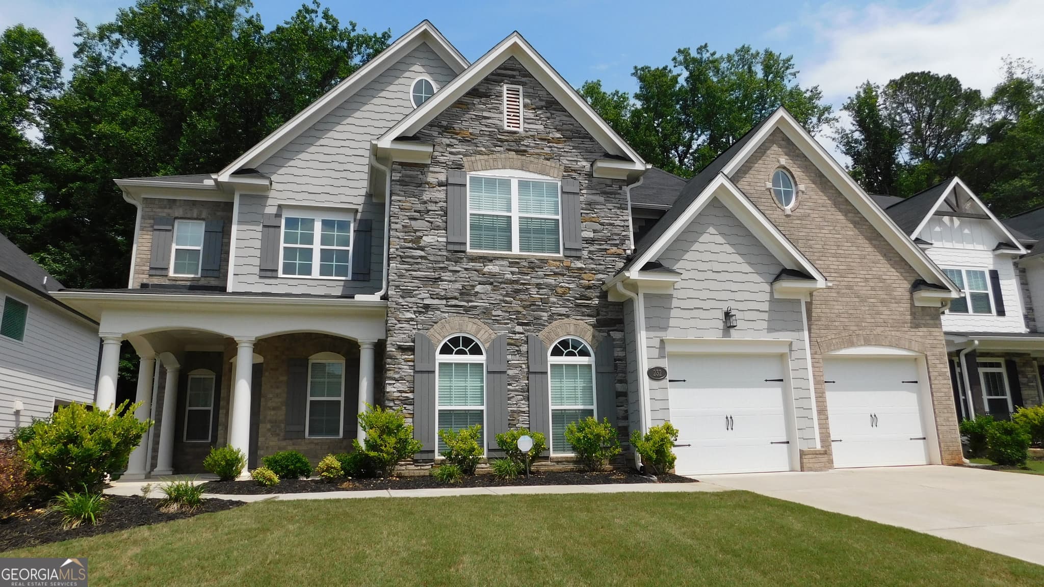 5 bedroom, 4 bathroom, 3,362 sq ft single family residence for sale at 232 Wild Rose Circle, Holly Springs, GA 30115