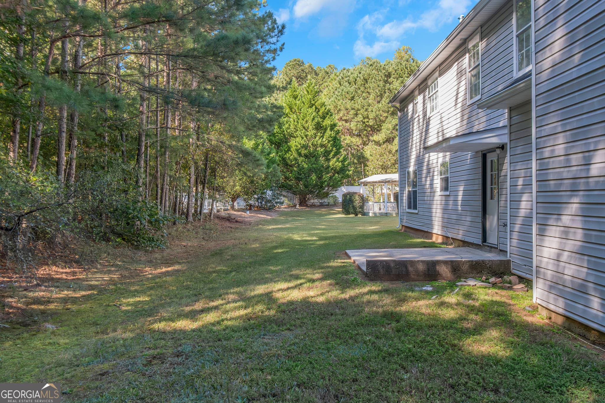 4 bedroom, 2.5 bathroom, 3,174 sq ft single family residence for rent at 10806 Misty Meadows Court, Hampton, GA 30228 for $2,195 a month — photo 3