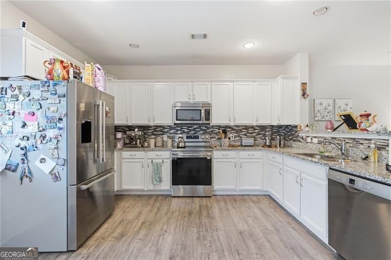 3 bedroom, 2.5 bathroom, 1,658 sq ft condominium for sale at 3135 Cedar Glade Lane, Buford, GA 30519 — photo 10