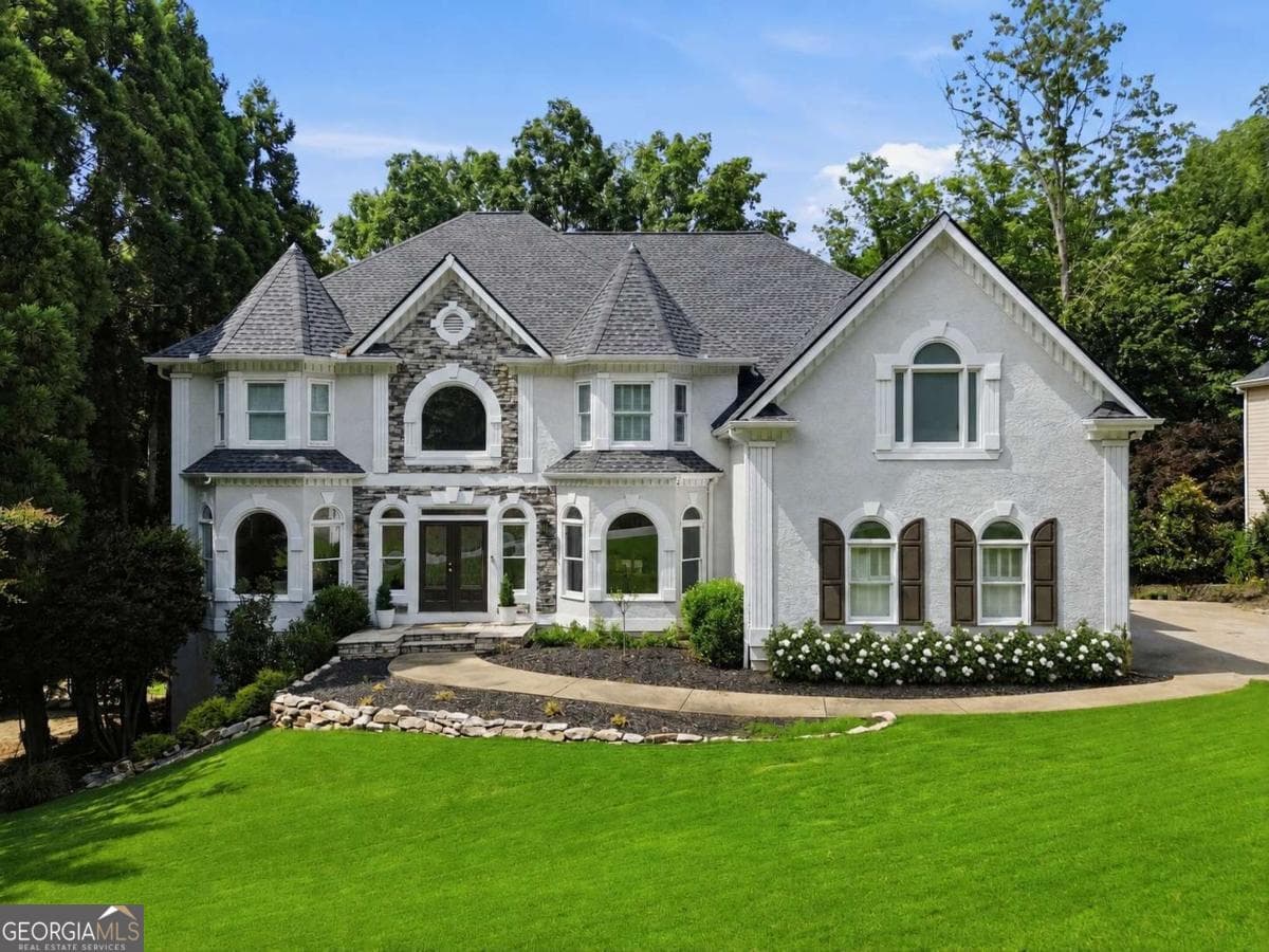 5 bedroom, 4.5 bathroom, 6,257 sq ft single family residence sold at 422 Lovingood Landing Drive, Woodstock, GA 30189