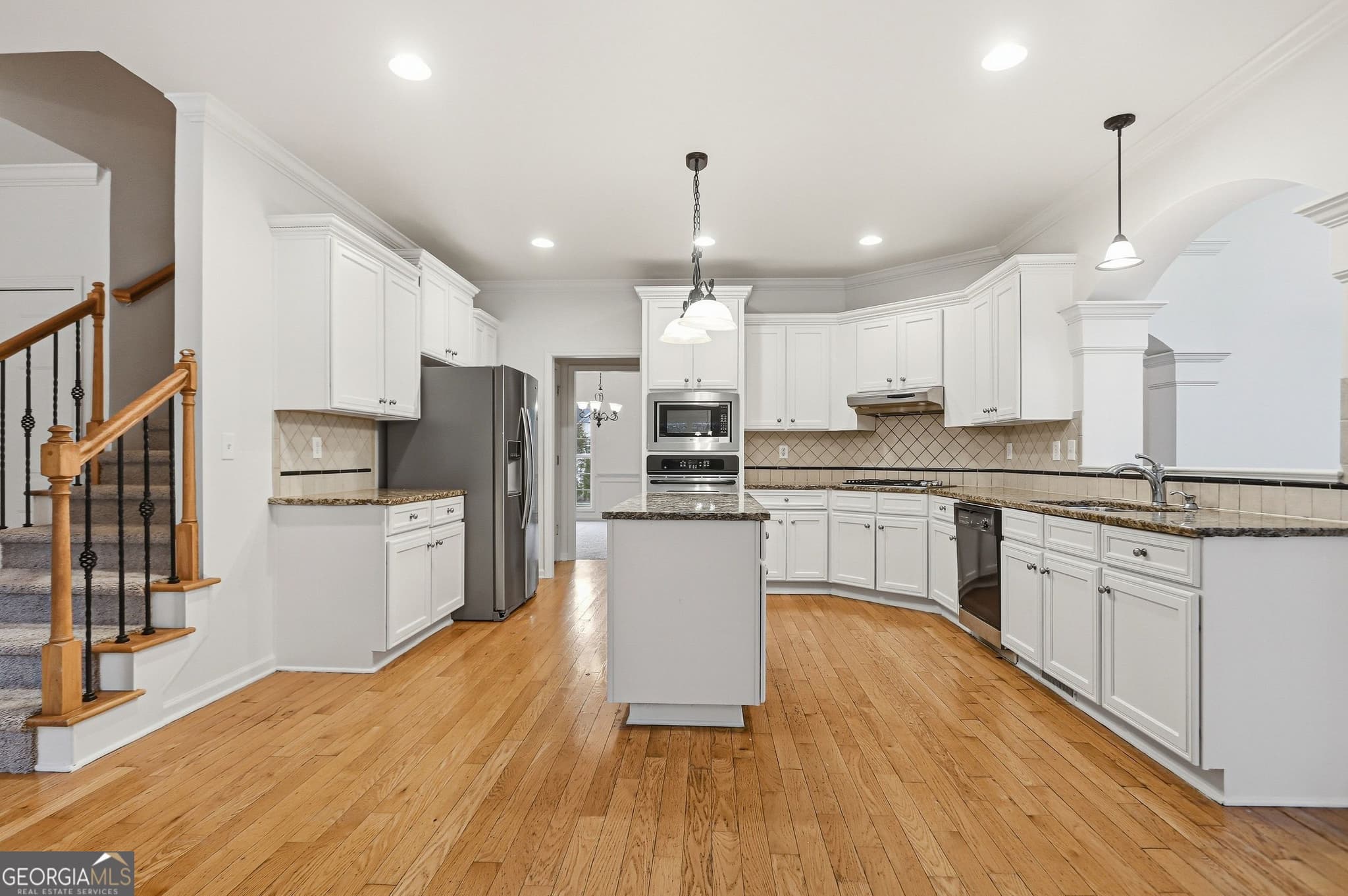 6 bedroom, 4.5 bathroom, 5,147 sq ft single family residence for sale at 318 Hamilton Drive, Conyers, GA 30094 — photo 2