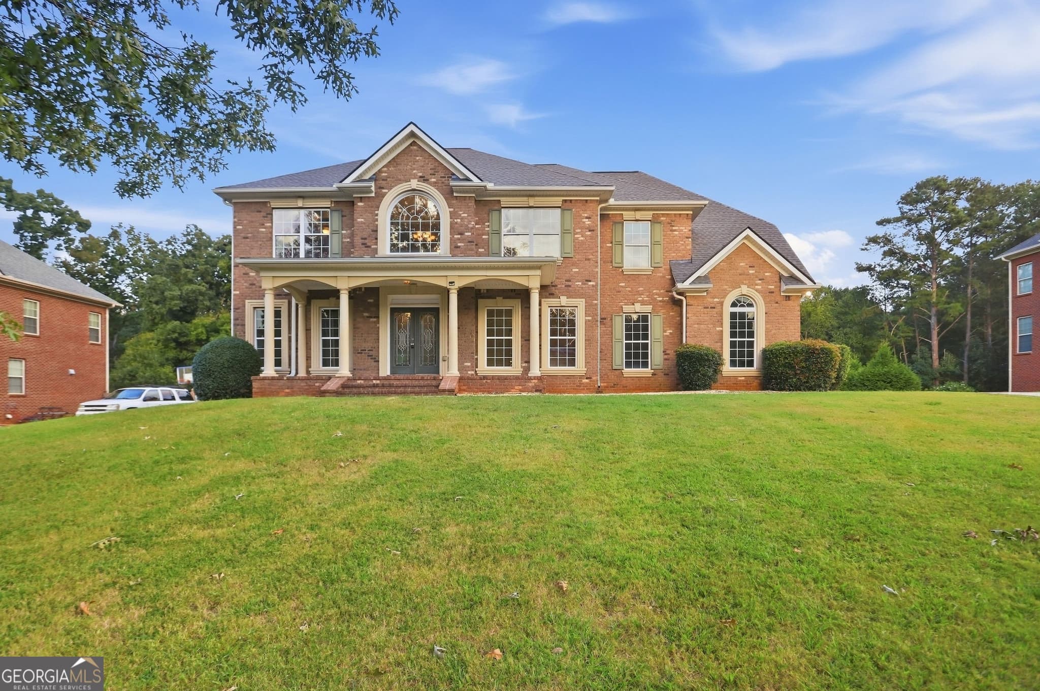 6 bedroom, 4.5 bathroom, 5,147 sq ft single family residence for sale at 318 Hamilton Drive, Conyers, GA 30094 — photo 1 of 37