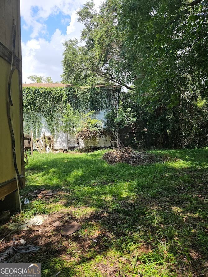 4 bedroom, 2 bathroom, 1,728 sq ft single family residence for sale at 2118 Harden Street, Savannah, GA 31415 — photo 6