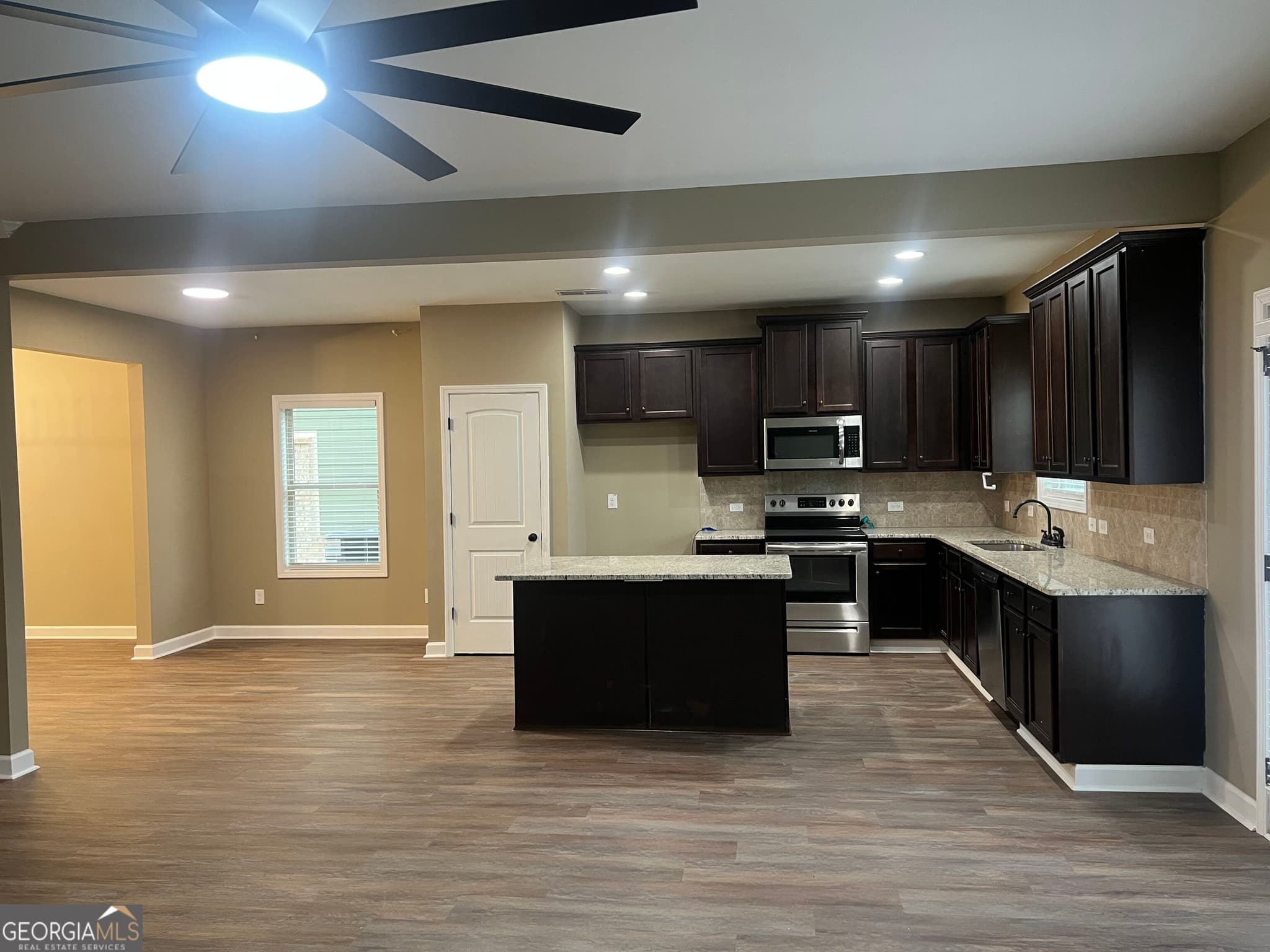5 bedroom, 3 bathroom, 2,607 sq ft single family residence for sale at 6034 Prodigy Lane, Locust Grove, GA 30248 — photo 6