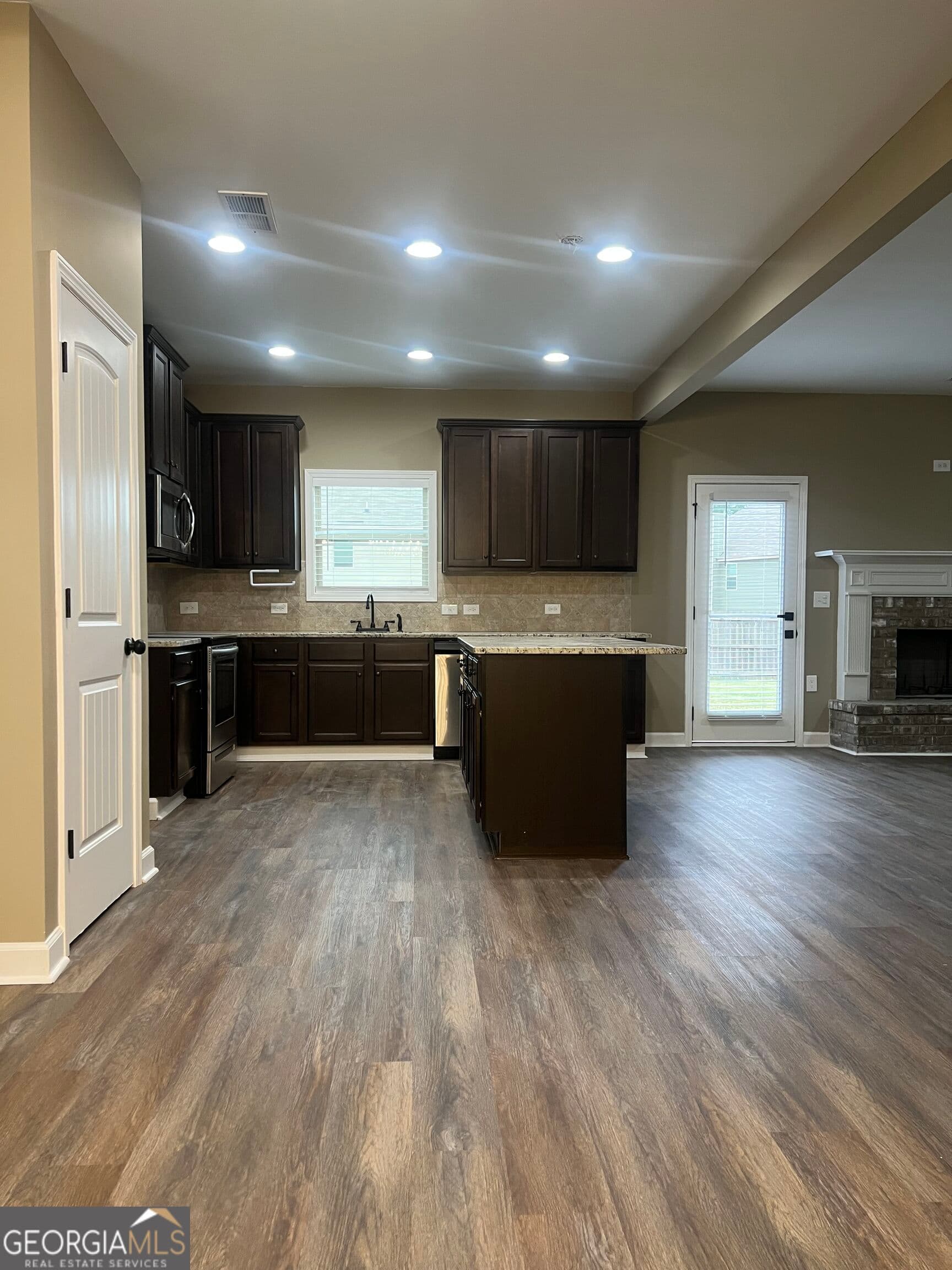 5 bedroom, 3 bathroom, 2,607 sq ft single family residence for sale at 6034 Prodigy Lane, Locust Grove, GA 30248 — photo 4