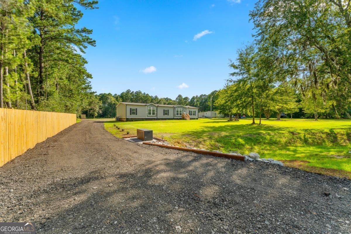 4 bedroom, 2 bathroom, 2,254 sq ft manufactured home,single family residence for sale at 302 Middleton Road, Guyton, GA 31312 — photo 5