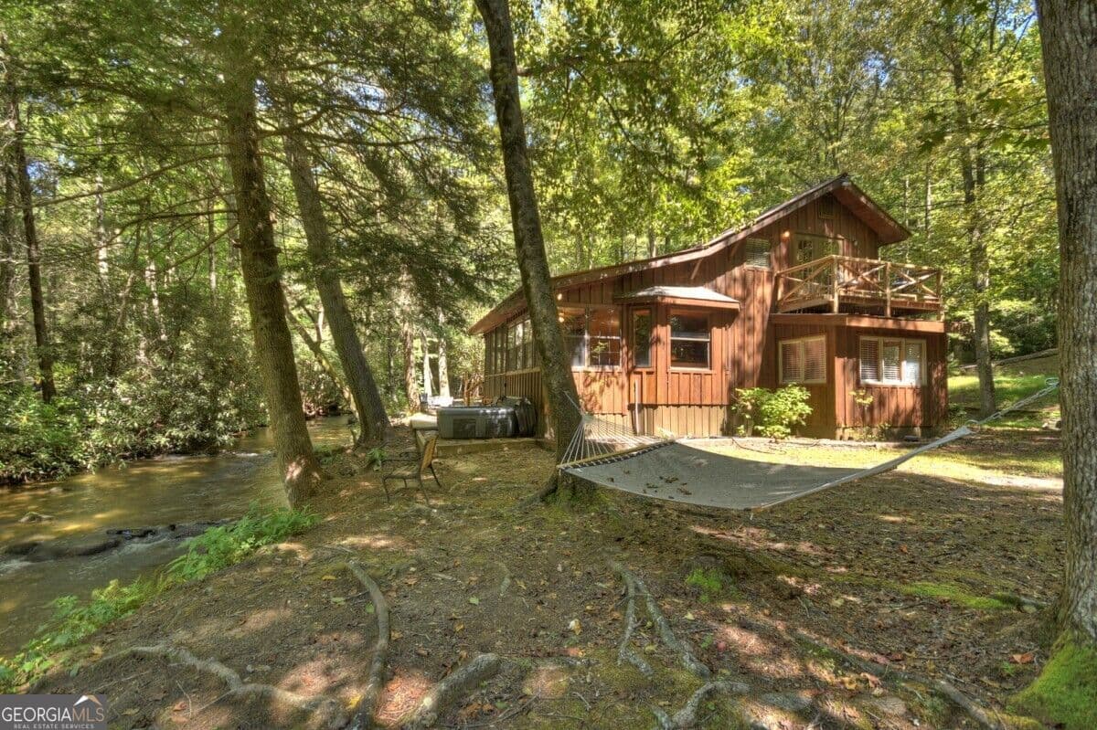 2 bedroom, 2 bathroom, 1,423 sq ft cabin,single family residence for sale at 5757 Old Bucktown Road, Ellijay, GA 30536 — photo 1 of 27