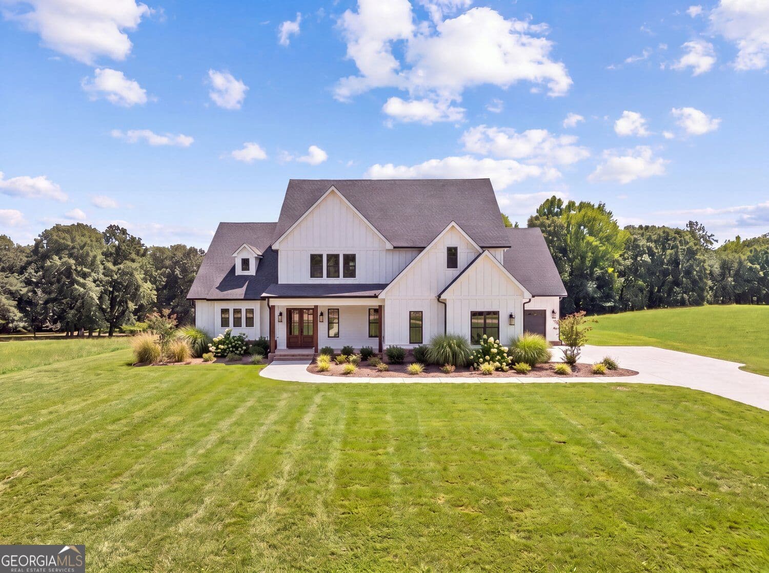 5 bedroom, 5 bathroom, 4,680 sq ft single family residence for sale at 1430.6 Lee Peters Road, Loganville, GA 30052 — photo 1 of 52