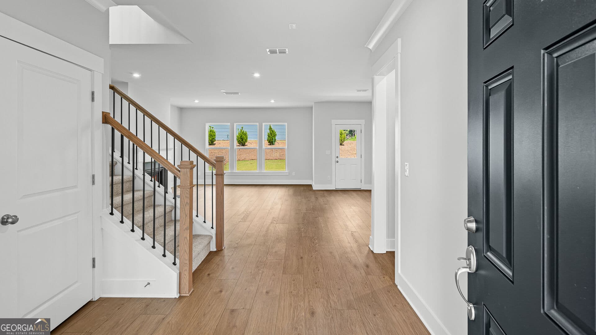 3 bedroom, 2.5 bathroom, 2,444 sq ft single family residence for sale at 4753 Sunburst Street, Flowery Branch, GA 30542 — photo 4