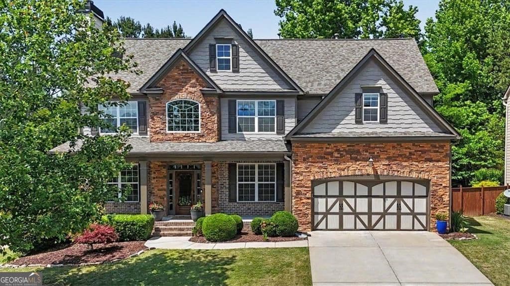 7 bedroom, 5 bathroom, 4,582 sq ft single family residence sold at 122 Lakestone Parkway, Woodstock, GA 30188