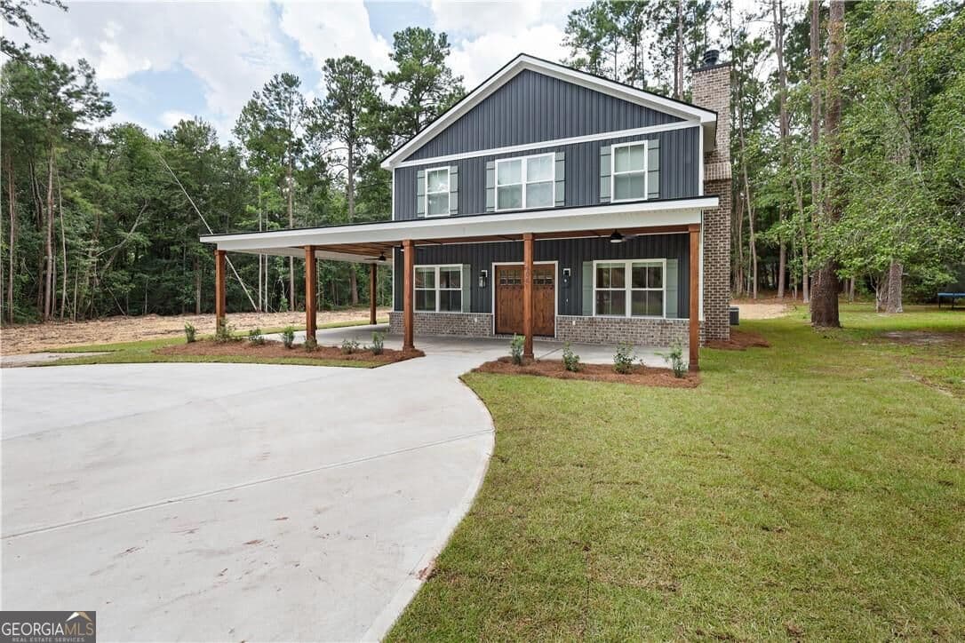5 bedroom, 3 bathroom, 2,417 sq ft loft,single family residence for sale at 406 S Ash Street, Springfield, GA 31329 — photo 2