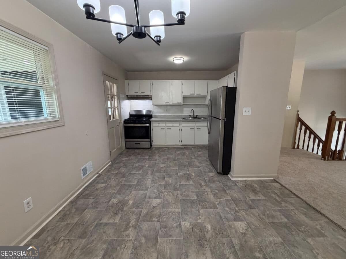 5 bedroom, 2 bathroom single family residence for rent at 1340 Pineglen Drive, Riverdale, GA 30296 for $1,895 a month — photo 6