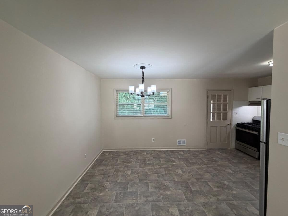 5 bedroom, 2 bathroom single family residence for rent at 1340 Pineglen Drive, Riverdale, GA 30296 for $1,895 a month — photo 5