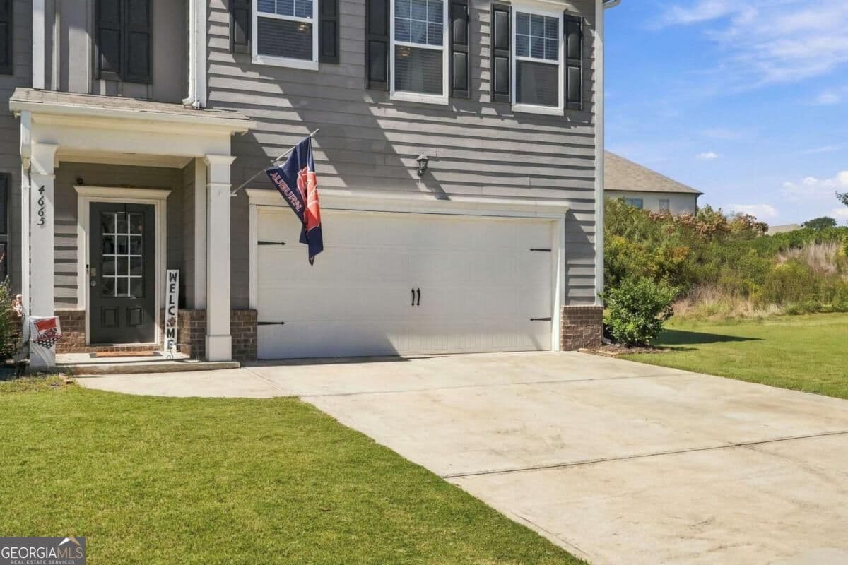 5 bedroom, 3 bathroom, 2,563 sq ft single family residence for sale at 4665 Dandelion Way, Cumming, GA 30040 — photo 2