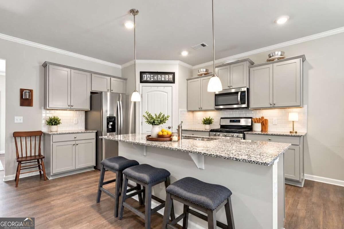 5 bedroom, 3 bathroom, 2,563 sq ft single family residence for sale at 4665 Dandelion Way, Cumming, GA 30040 — photo 7