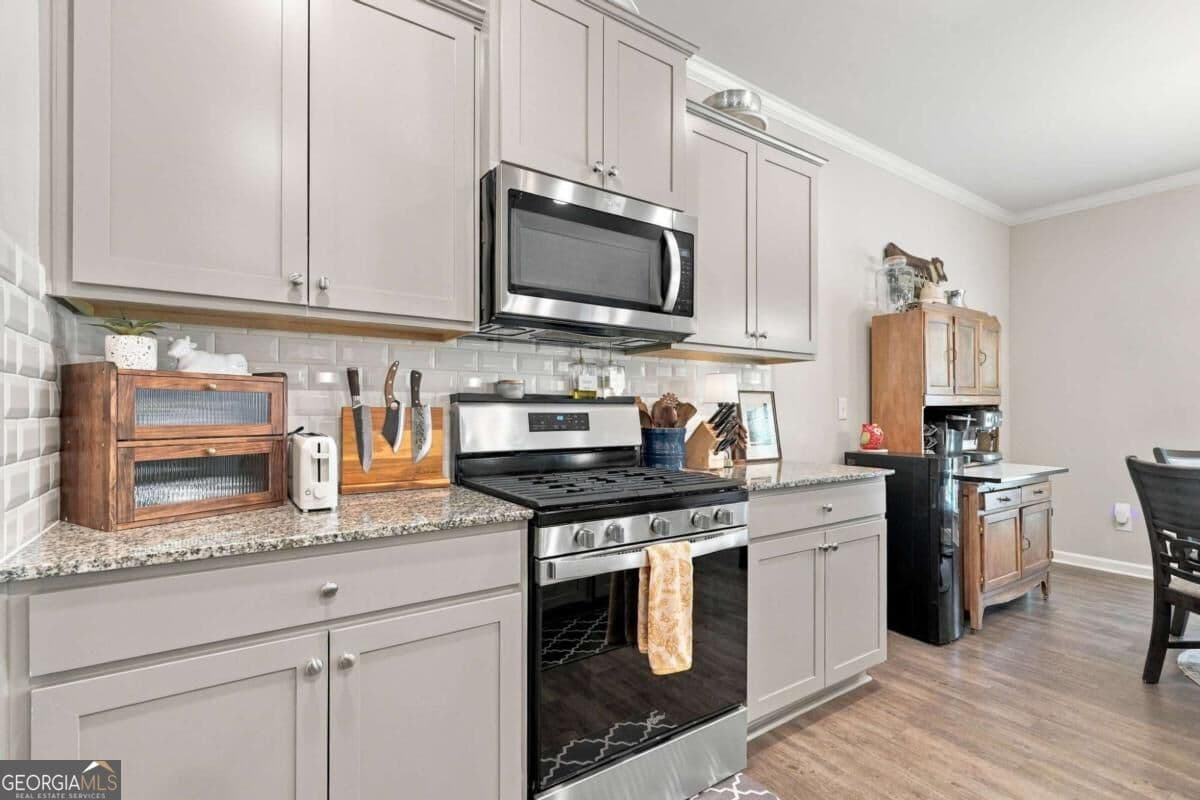 5 bedroom, 3 bathroom, 2,563 sq ft single family residence for sale at 4665 Dandelion Way, Cumming, GA 30040 — photo 10