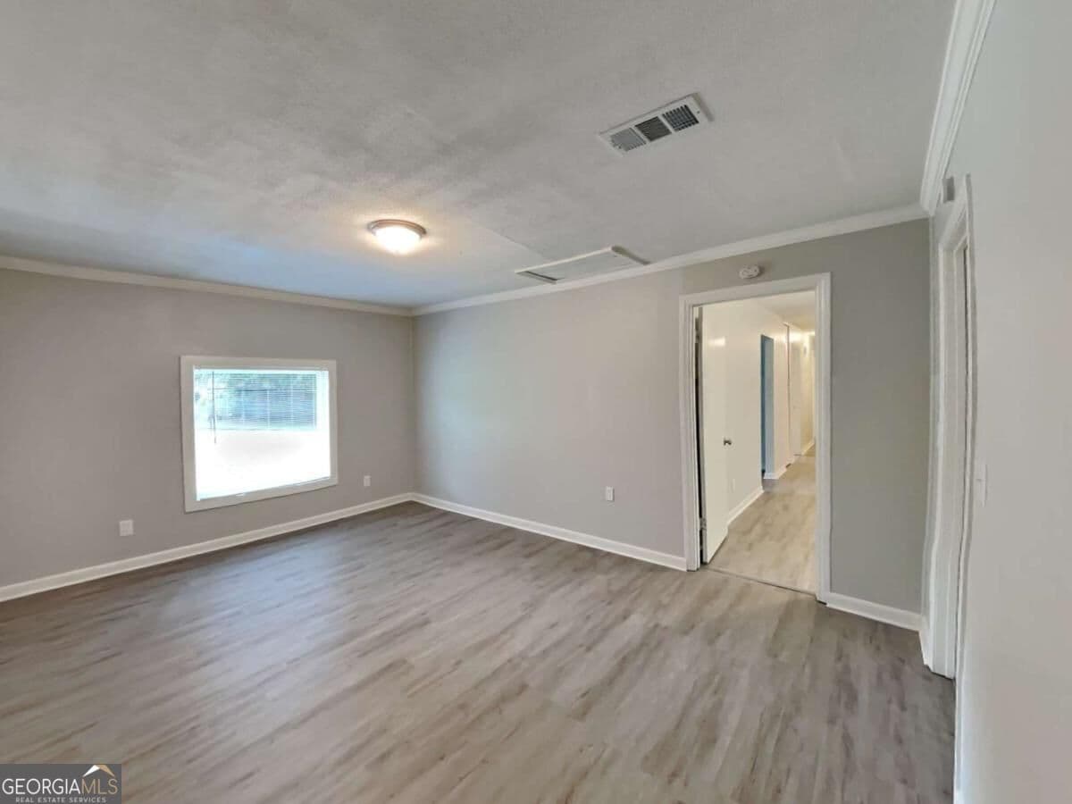 3 bedroom, 1.5 bathroom single family residence for rent at 2938 Woodfield Drive, Rex, GA 30273 for $1,735 a month — photo 6