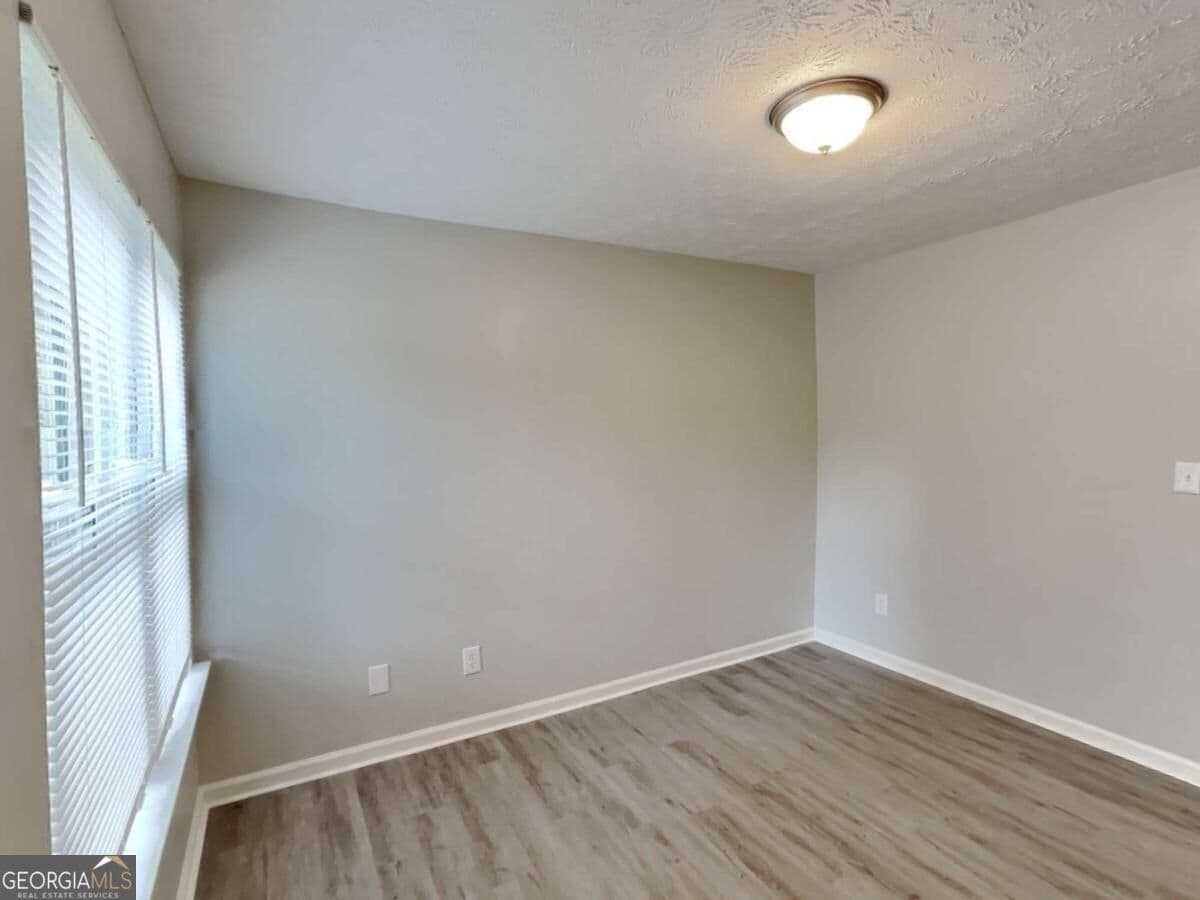 3 bedroom, 1.5 bathroom single family residence for rent at 2938 Woodfield Drive, Rex, GA 30273 for $1,735 a month — photo 7