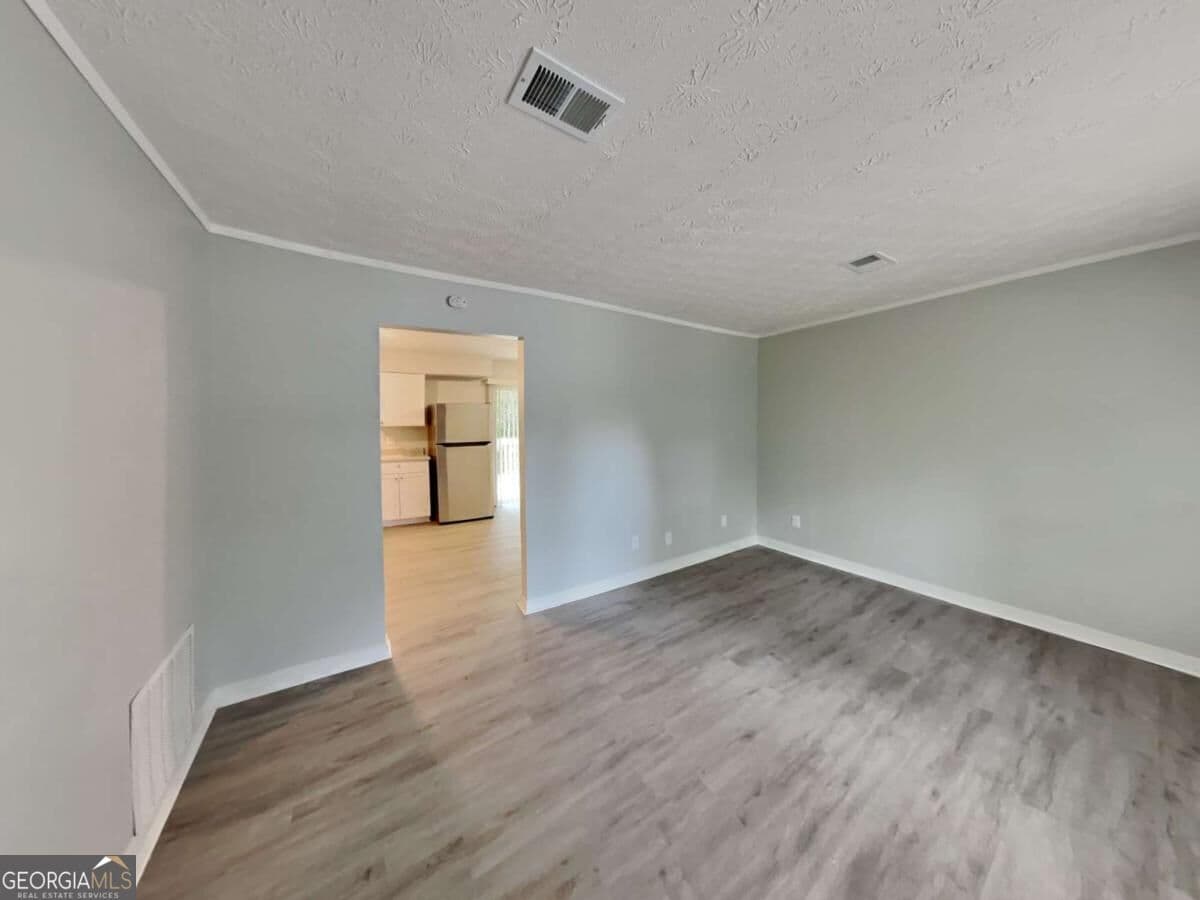3 bedroom, 1.5 bathroom single family residence for rent at 2938 Woodfield Drive, Rex, GA 30273 for $1,735 a month — photo 5