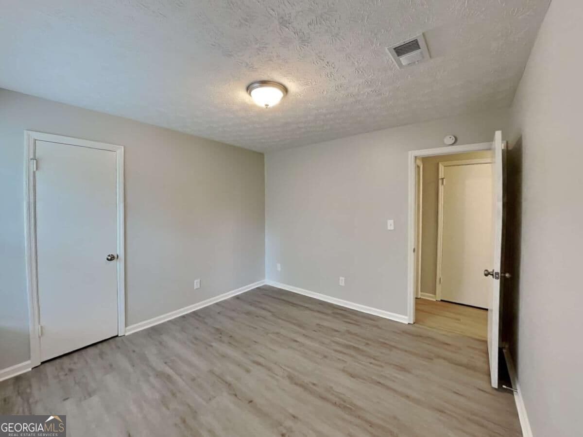 3 bedroom, 1.5 bathroom single family residence for rent at 2938 Woodfield Drive, Rex, GA 30273 for $1,735 a month — photo 9