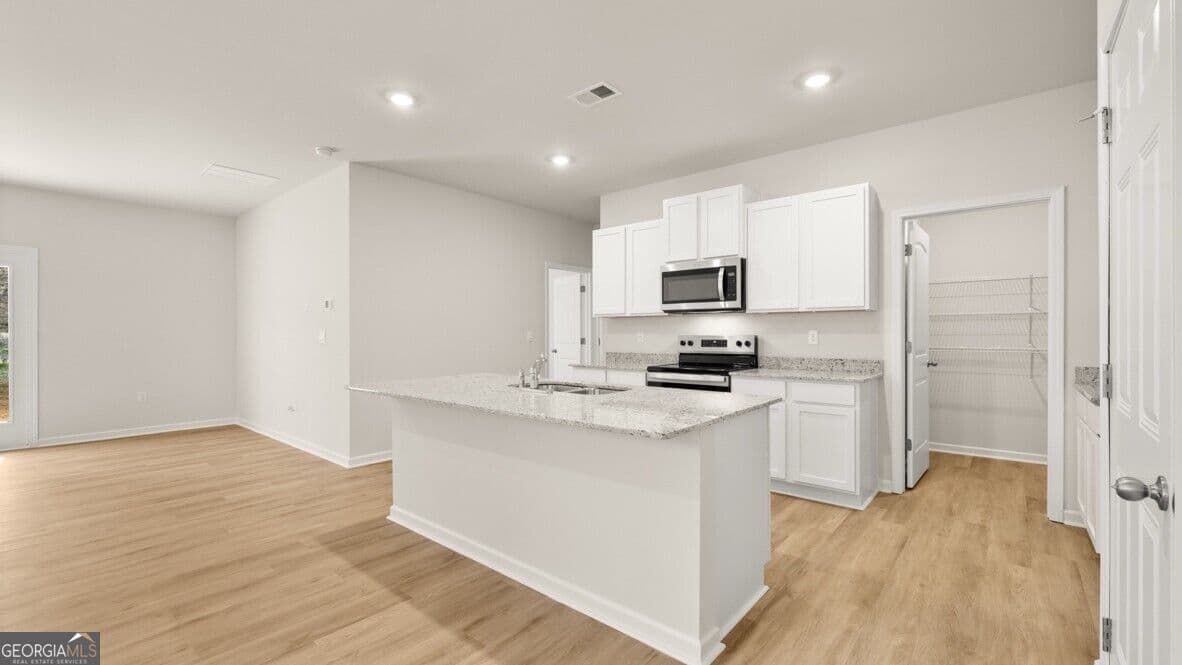 5 bedroom, 3 bathroom, 2,361 sq ft single family residence for sale at 2965 Holden Street, Gainesville, GA 30507 — photo 5
