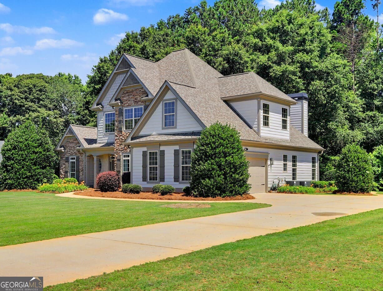 4 bedroom, 2.5 bathroom, 2,370 sq ft single family residence for sale at 4 White Oak Lane, Sharpsburg, GA 30277 — photo 2
