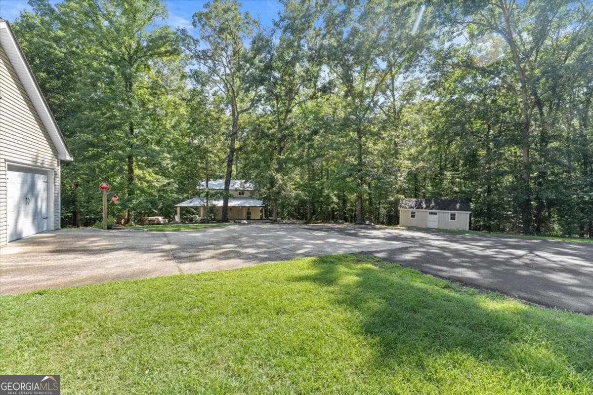 5 bedroom, 4 bathroom, 3,776 sq ft single family residence for sale at 342 Woodland Path, Dallas, GA 30132 — photo 5