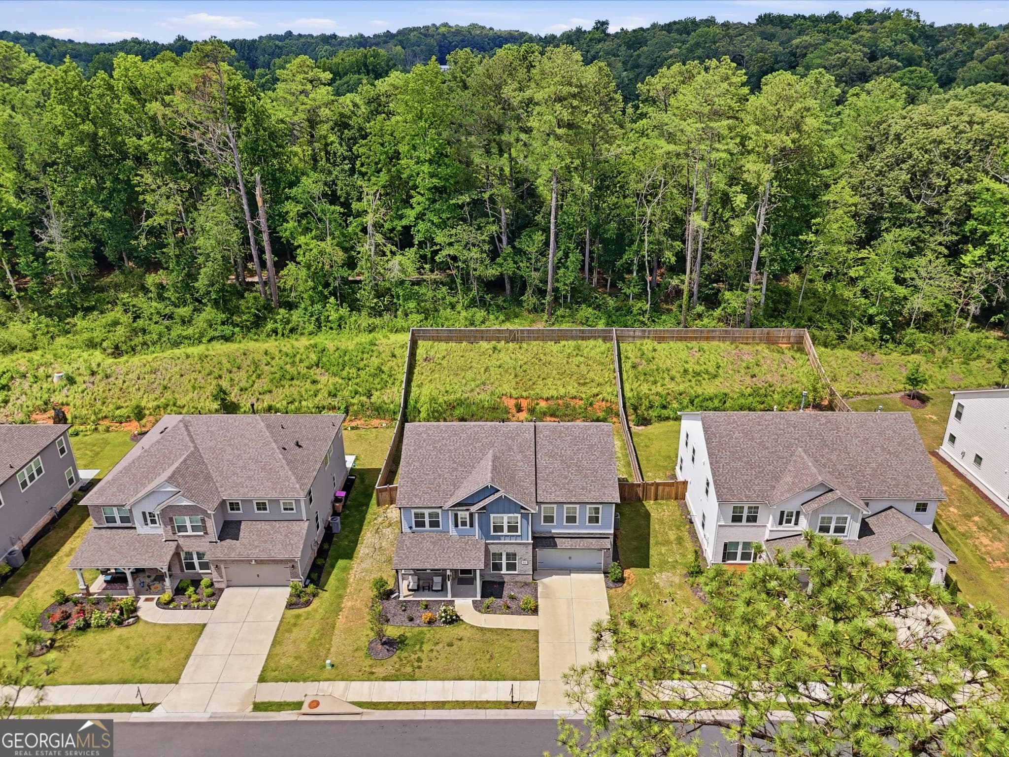 5 bedroom, 4.5 bathroom, 3,190 sq ft single family residence for sale at 5145 Lansdale Court, Cumming, GA 30028 — photo 2