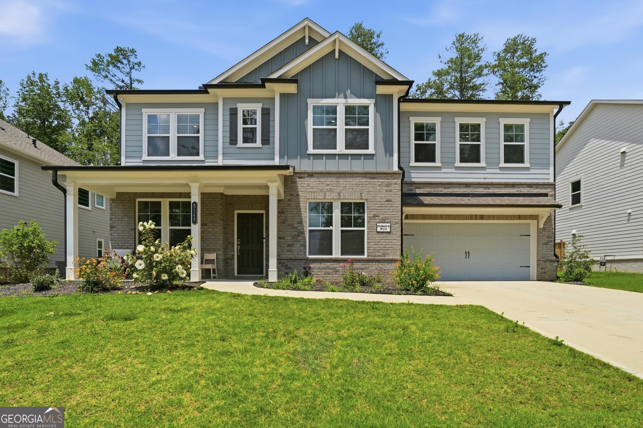 5 bedroom, 4.5 bathroom, 3,190 sq ft single family residence for sale at 5145 Lansdale Court, Cumming, GA 30028 — photo 10