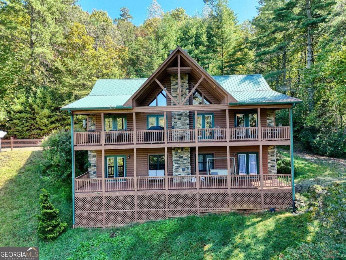 4 bedroom, 3 bathroom, 2,088 sq ft cabin,single family residence for sale at 5702 Valley View Drive, Hiawassee, GA 30546 — photo 1 of 51