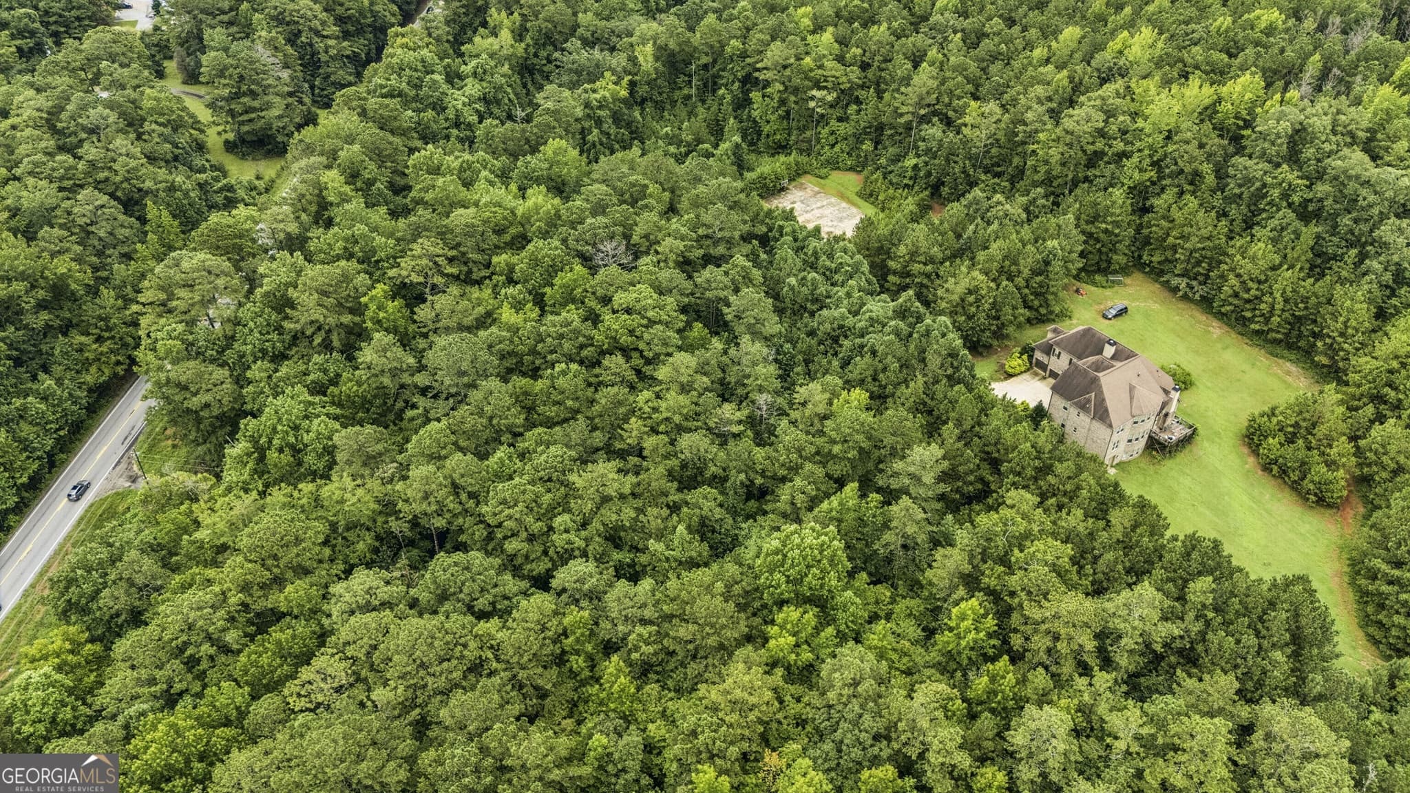 3 bedroom, 2 bathroom, 1,872 sq ft single family residence for sale at 6733 Highway 155, Stockbridge, GA 30281 — photo 2