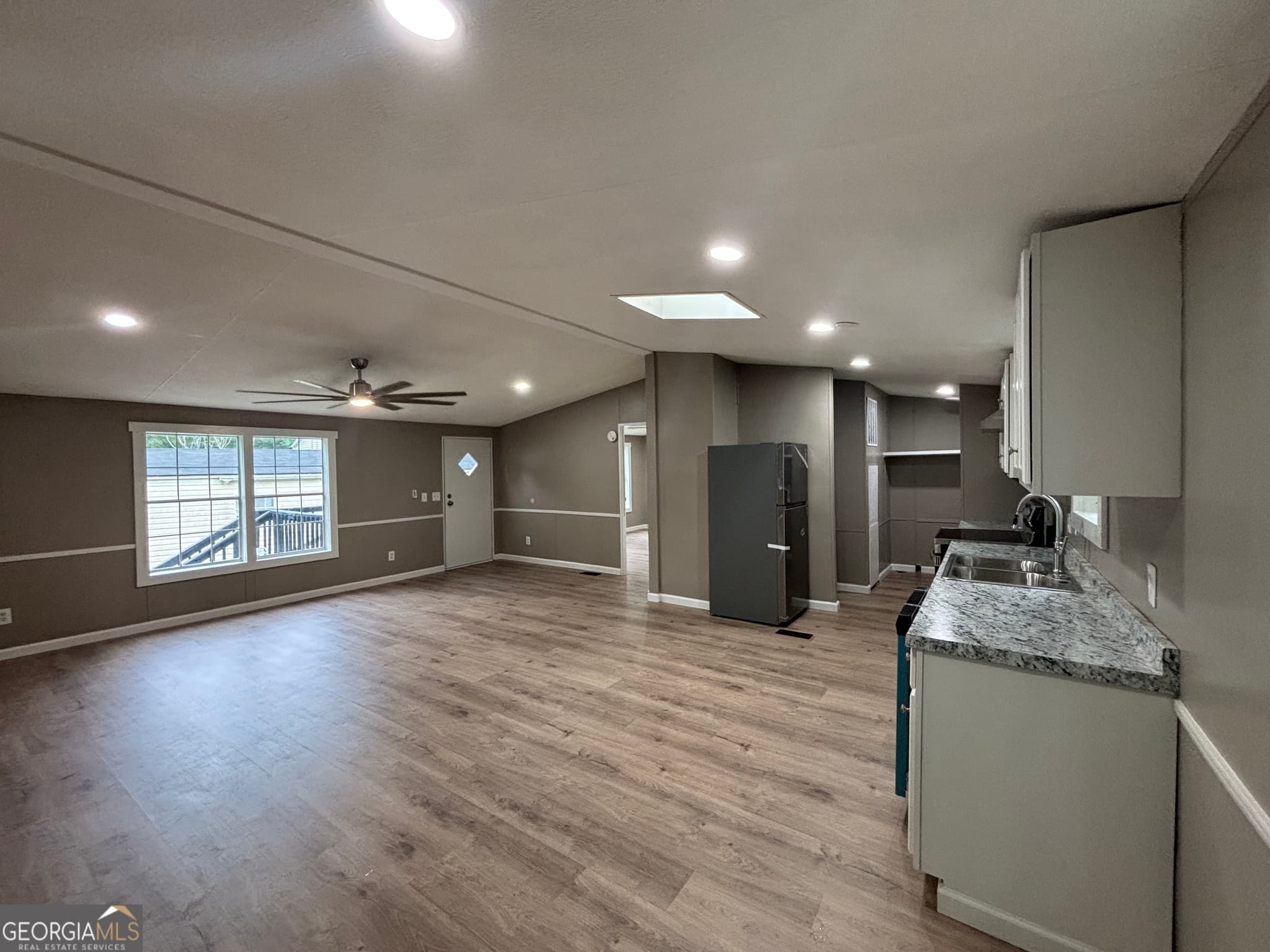 3 bedroom, 2 bathroom, 1,650 sq ft manufactured home,single family residence for sale at 225 Stratford Drive, Hampton, GA 30228 — photo 7