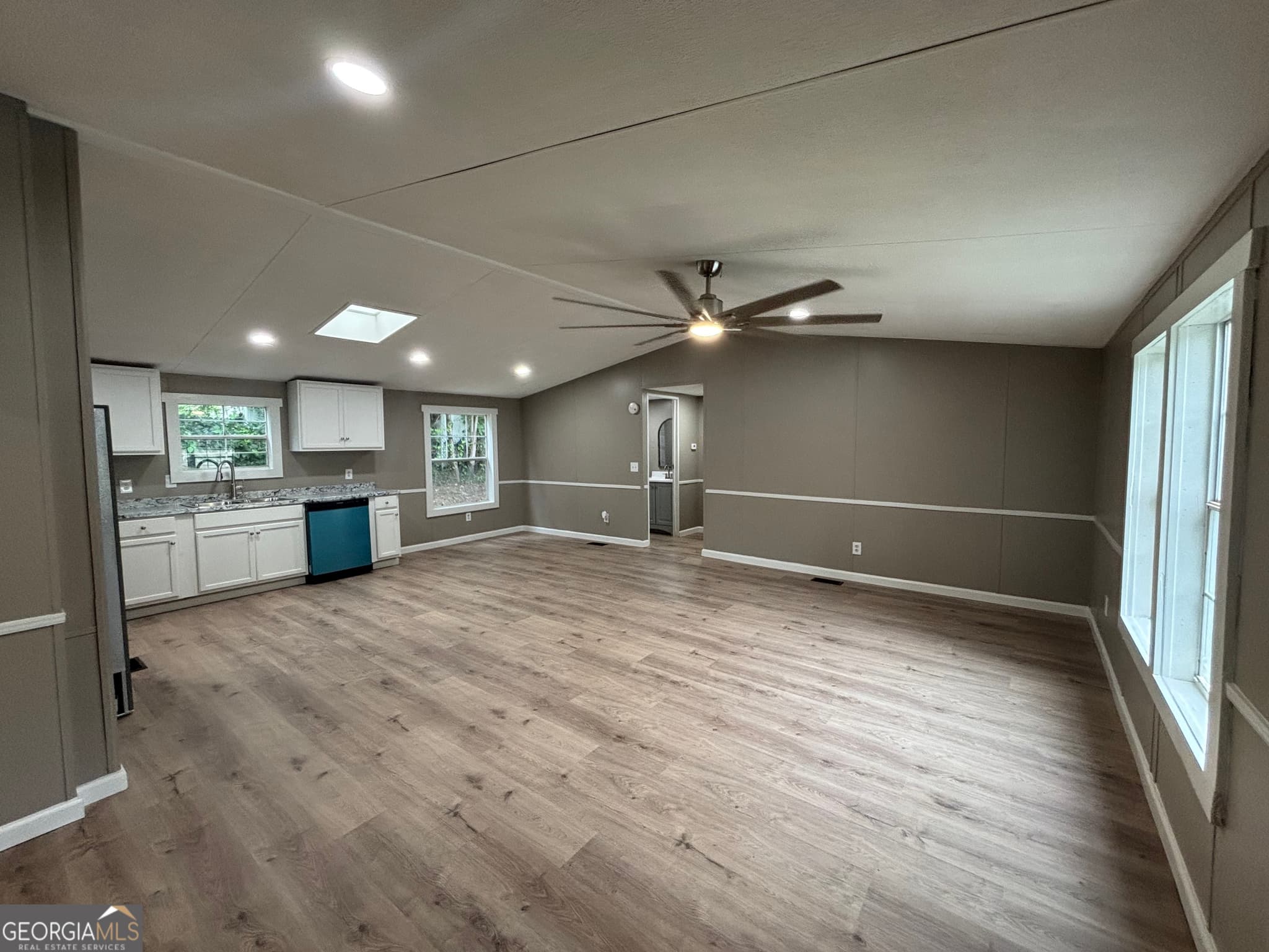 3 bedroom, 2 bathroom, 1,650 sq ft manufactured home,single family residence for sale at 225 Stratford Drive, Hampton, GA 30228 — photo 3