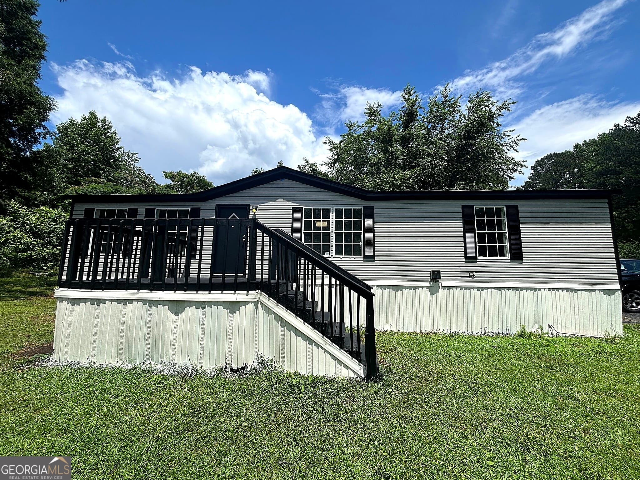 3 bedroom, 2 bathroom, 1,650 sq ft manufactured home,single family residence for sale at 225 Stratford Drive, Hampton, GA 30228