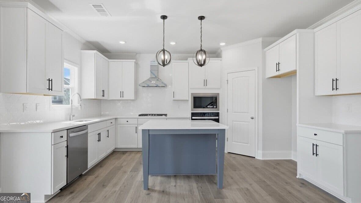 5 bedroom, 4 bathroom, 3,363 sq ft single family residence for sale at 7169 Bocholt Drive, South Fulton, GA 30349 — photo 7