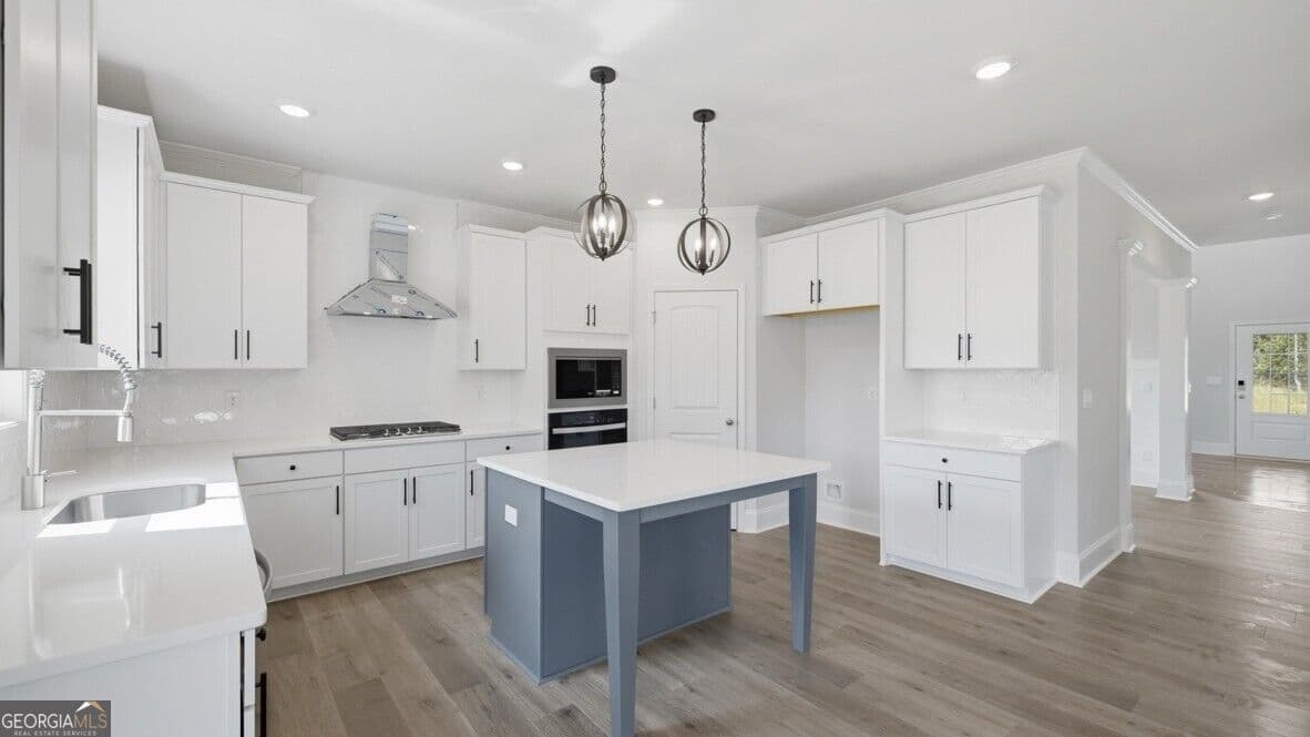 5 bedroom, 4 bathroom, 3,363 sq ft single family residence for sale at 7169 Bocholt Drive, South Fulton, GA 30349 — photo 9